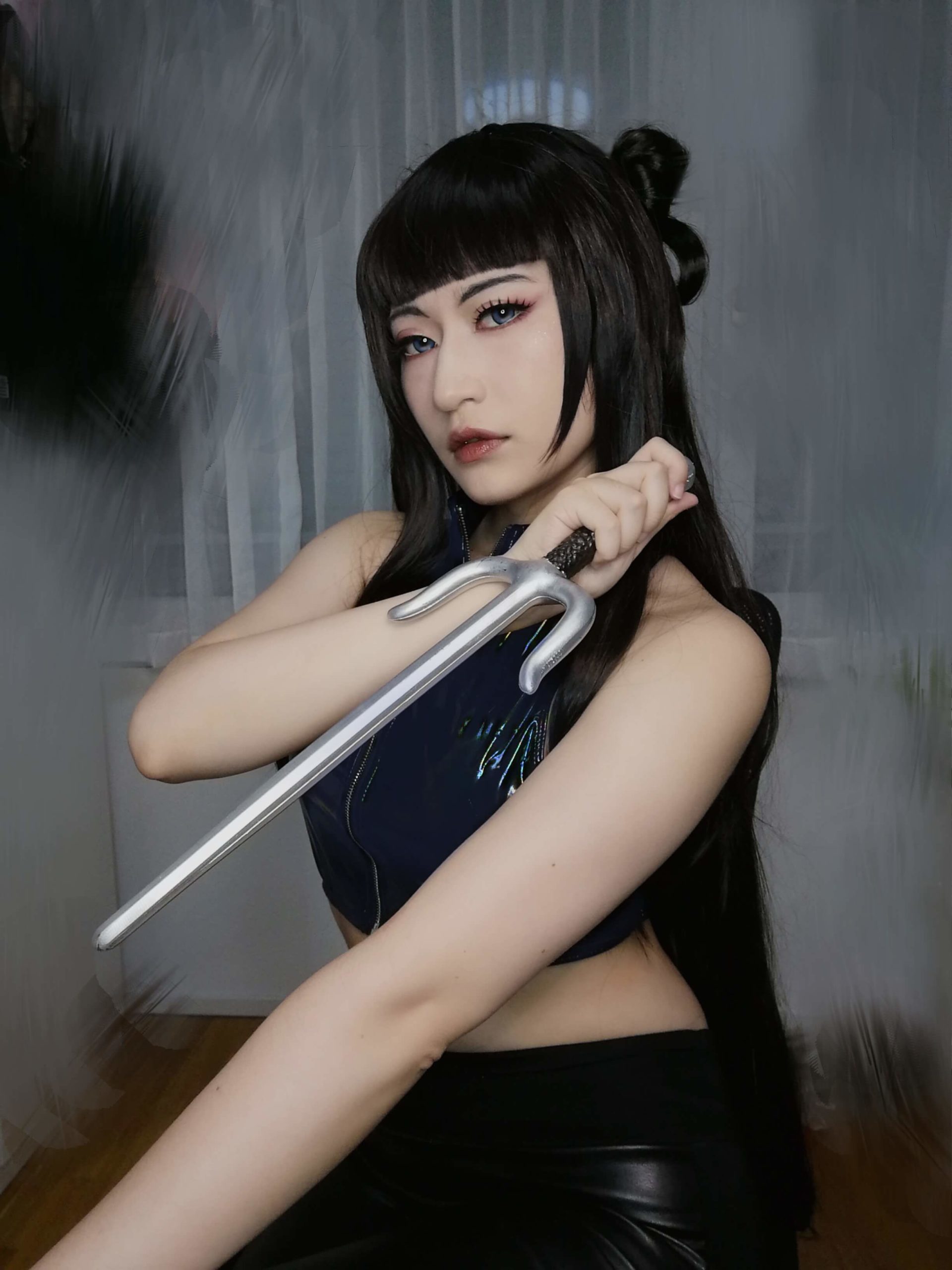 Mochhi_lin cosplaying Umi, photograph A
